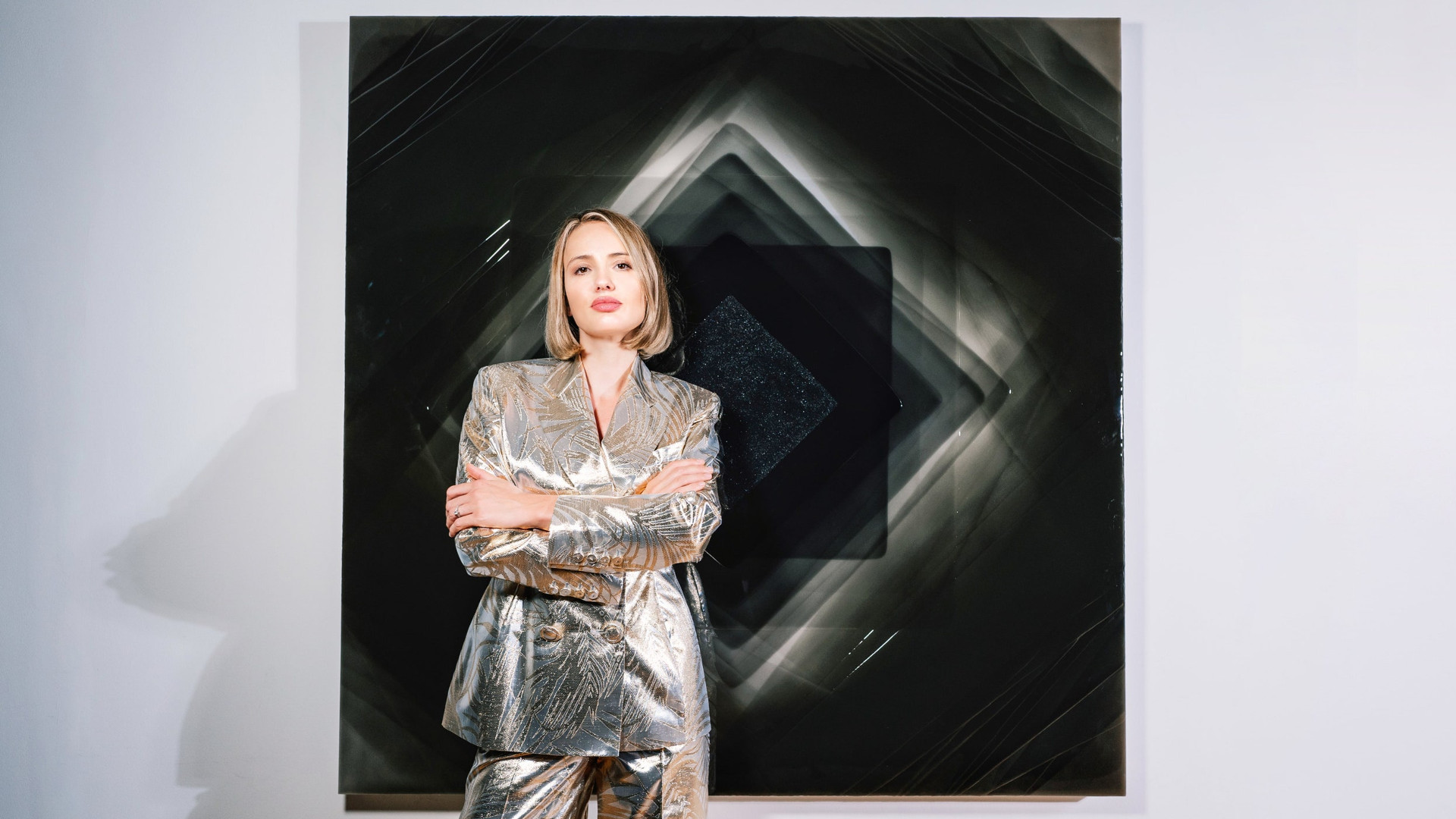 Artist Nat Bowen with "Black Diamond", the centrepiece of her 2020 collection "Back to Light" at the Saatchi Gallery