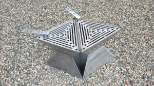 Two TetraflameXL Fire Pit SizzleChef barbecues can be put together in a diamond
