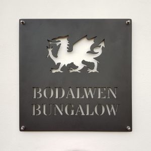 Arwydd Metel Du Draig Gymreig Welsh Dragon Black Metal House Sign Name Plate on a house