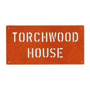 Modern rectangular metal house name plate sign in rusted industrial look Corten weathering steel