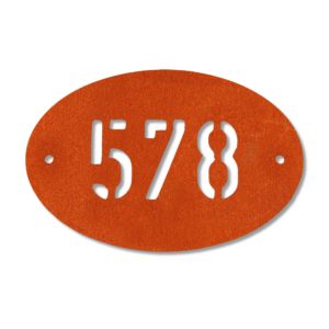 Modern oval metal house number in rusted industrial look Corten weathering steel