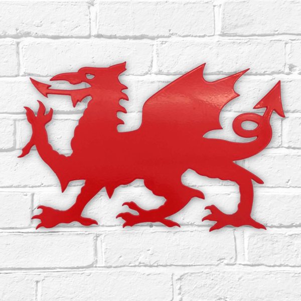 Arwydd Metel Draig Goch Red Welsh Dragon Metal Sign on a white brick wall