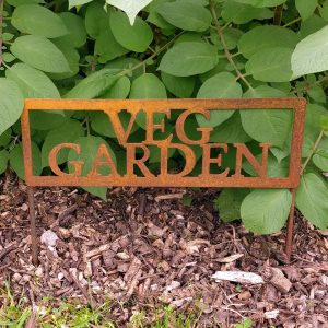 Vintage-look rusty metal two legged Veg Garden sign in our garden