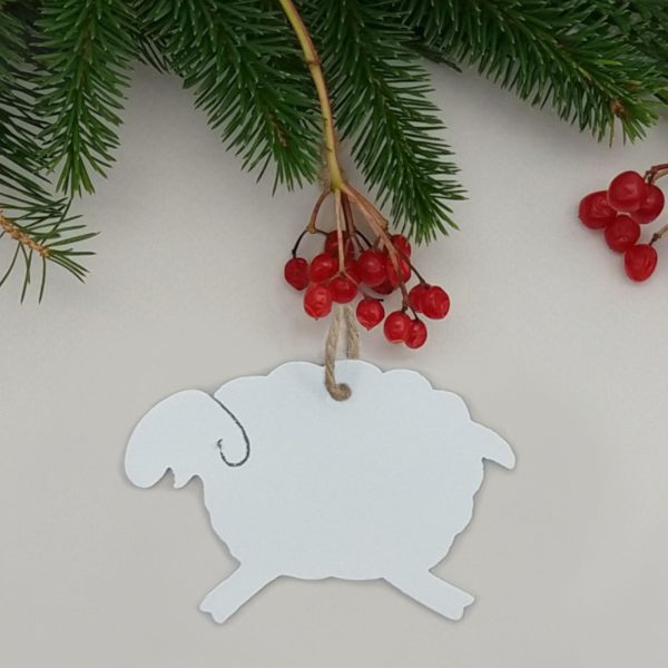 Baby Welsh lamb hanging Christmas decoration in fine textured snow white