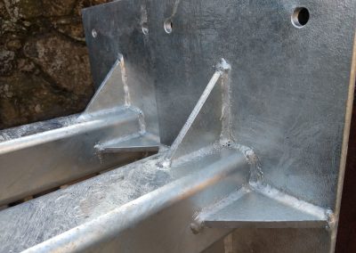 Detail of welding and galvanising on legs and base plates