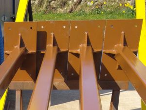 Closeup of painting on legs and base plates