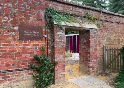 Completed COR-TEN weathering steel and stainless steel sign installed at NHS Wales' commemorative garden at Nevill Hall Hospital, Abergavenny