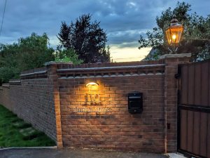 The completed sign installed at the customer's driveway entrance