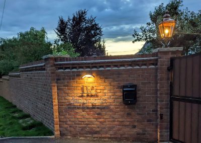 The completed sign installed at the customer's driveway entrance